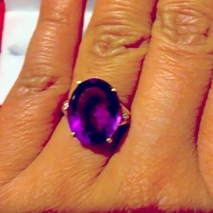 14k solid gold with natural amethyst stone.